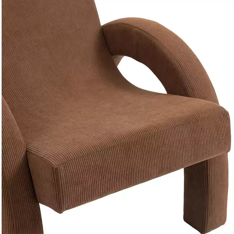 Poltrona rivestita in velluto a coste