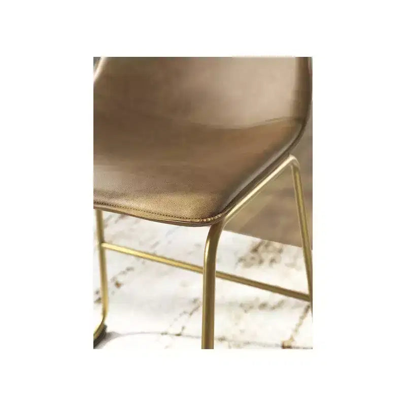 Signature Design by Ashley Lexadine Counter Height Bar Stools, Set of 2  Upholstered Faux Leather, Toast/Gold Finish, Modern Bucket Seat
