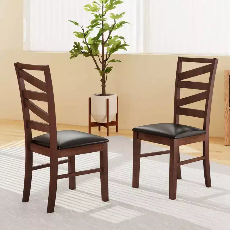 Lot de 2 chaises de salle à manger Costway avec pieds en bois d'hévéa et assise sans accoudoirs en similicuir